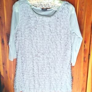 Cocoma grey ruffled top with sheer sleeves. Size L